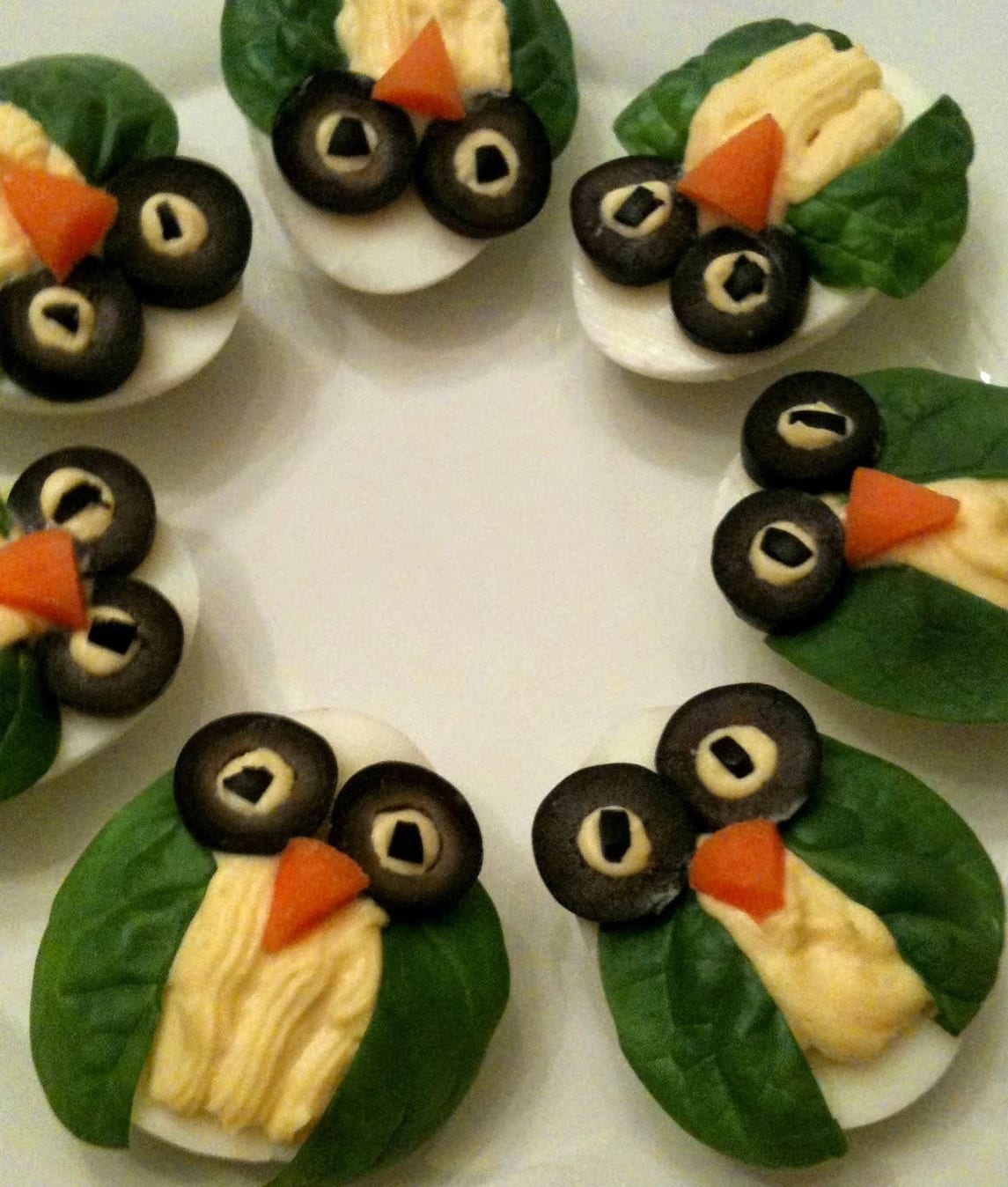 schnelle und interessante essen-dekorationen mit oliven und eiern