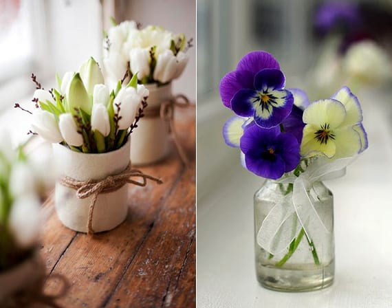 weiße tulpen und dunkelblauen Veilchen als frühlingsdeko fenster