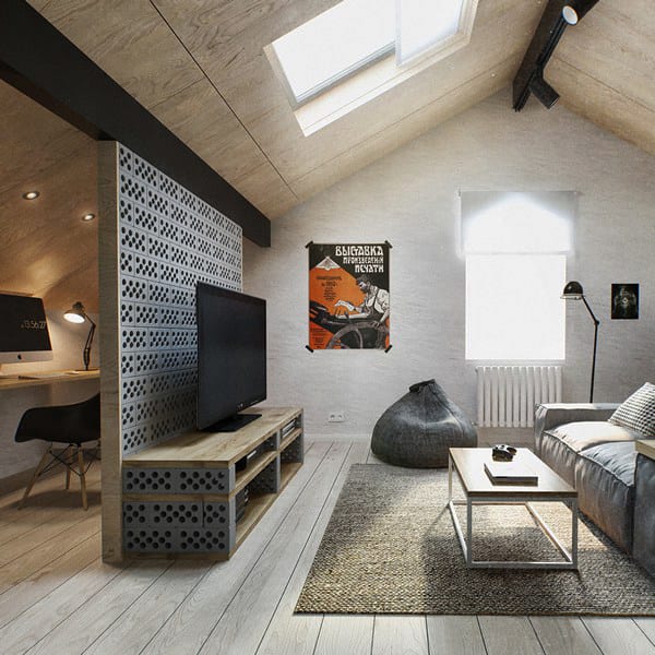 kreative raumtrennung einer Dachwohnung mit Trennwand und TV-Bank aus Holz und Ziegeln