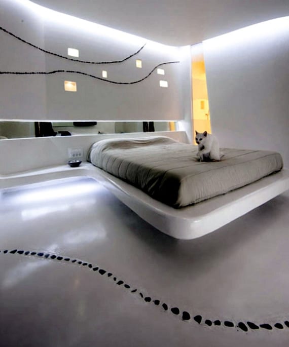 modernes schlafzimmer design in beton mit ausgemauertem schwebebett und spiegelband